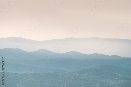 blue ridge mountains at sunset with mist