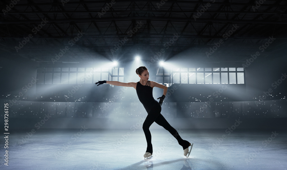 Figure skating girl in ice arena. Figure skating girl in ice arena.