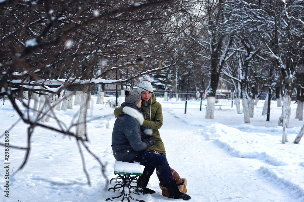 lovers on a bench in winter