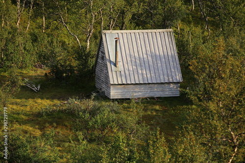 Mountain hut in Blasjofjalls nature reserve near the Wilderness Road in Sweden photo