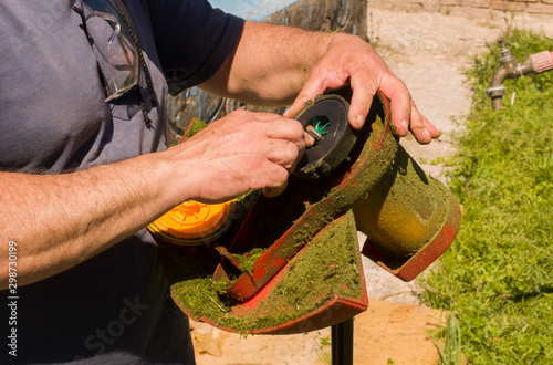 man doing a review to a edger