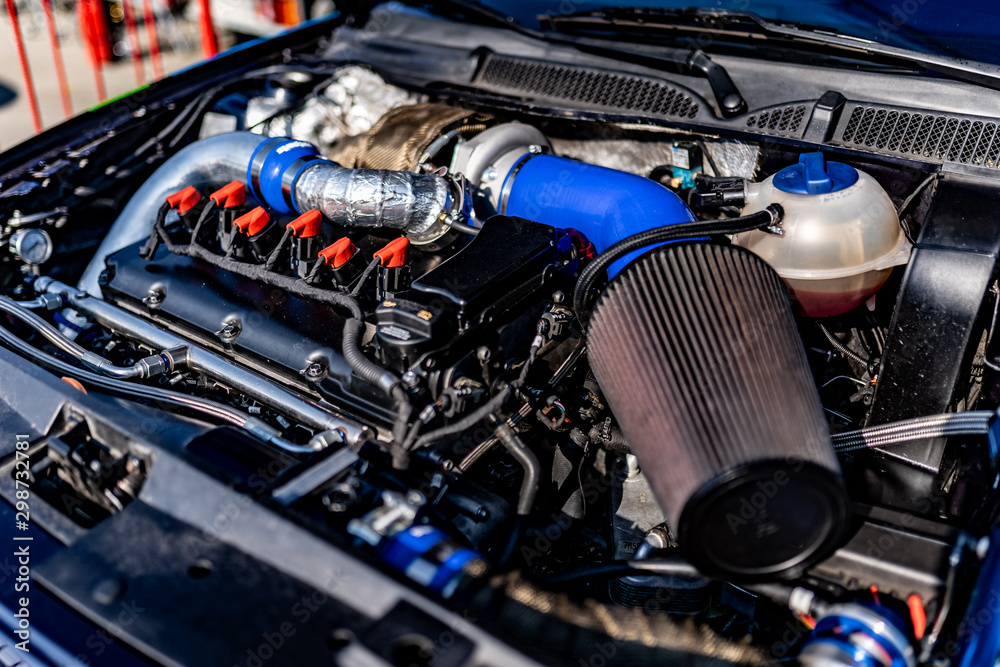 Performance sports car engine bay Photos | Adobe Stock
