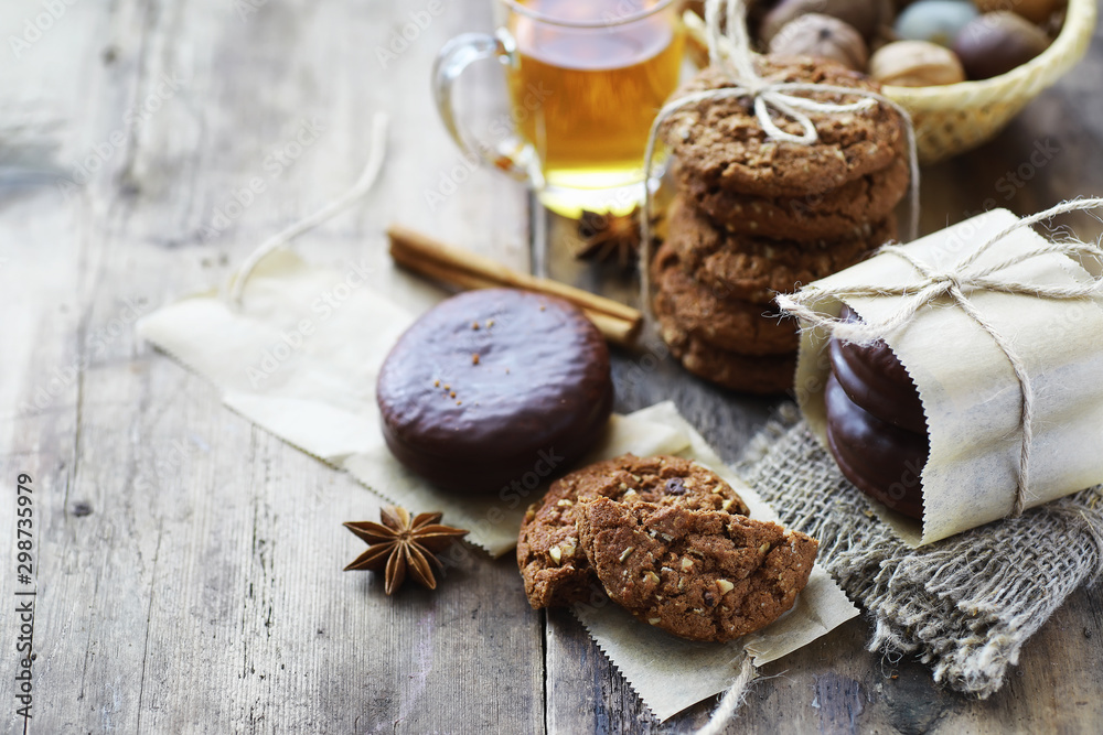 Coffee table. Cup with a hot coffee drink. A set of fragrant cookies for breakfast for the holiday. Coffee table. Cup with a hot coffee drink. A set of fragrant cookies for breakfast for the holiday.