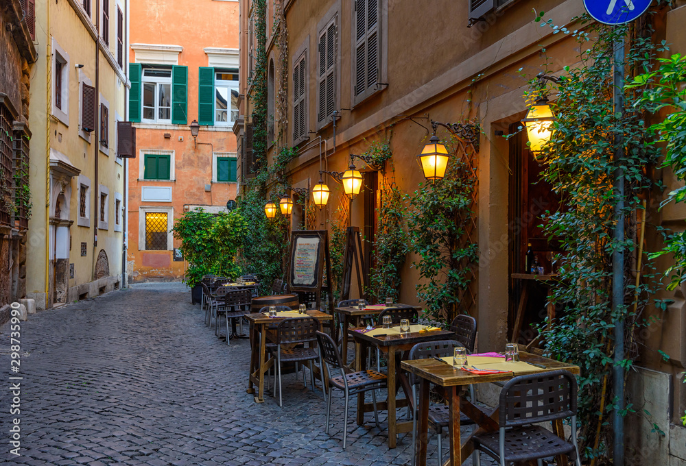 View of old narrow street in Rome, Italy. Architecture and landmark of Rome. Cozy cityscape of Rome.