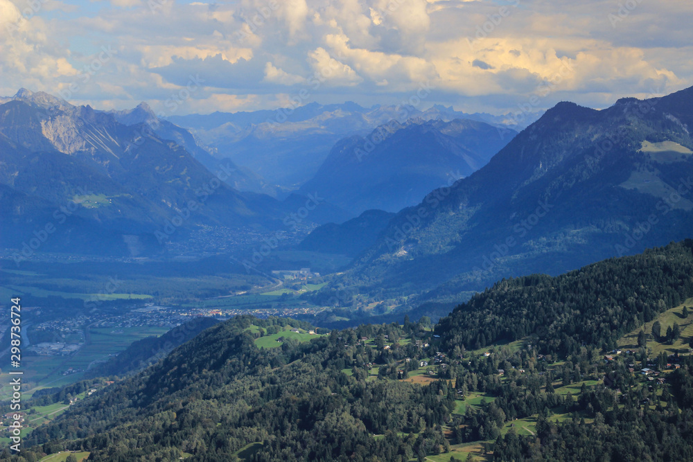 Fabulously beautiful European cozy landscape in the cozy Alps mountains in Liechtenstein on the border with Austria. View of the Vaduz Valley from a height.
