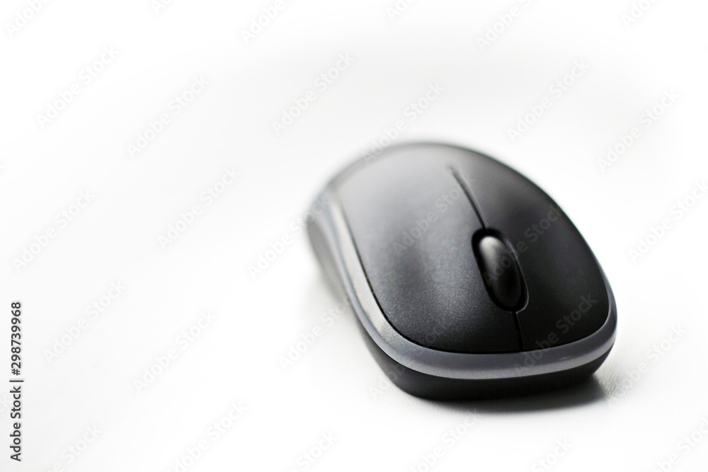 Computer wireless mouse on the table close up. Cumputer. IT. Technology Computer wireless mouse on the table close up. Cumputer. IT. Technology