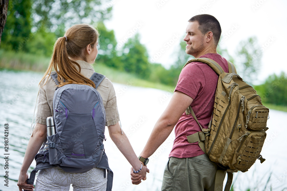 Fototapeta premium Two travelers near lakes