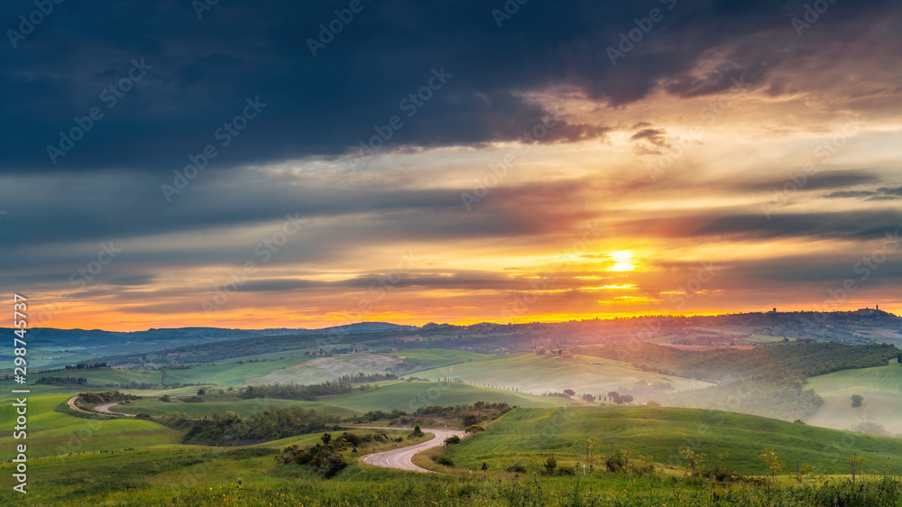 Fototapeta premium Beautiful Tuscany landscape at sunrise, Italy