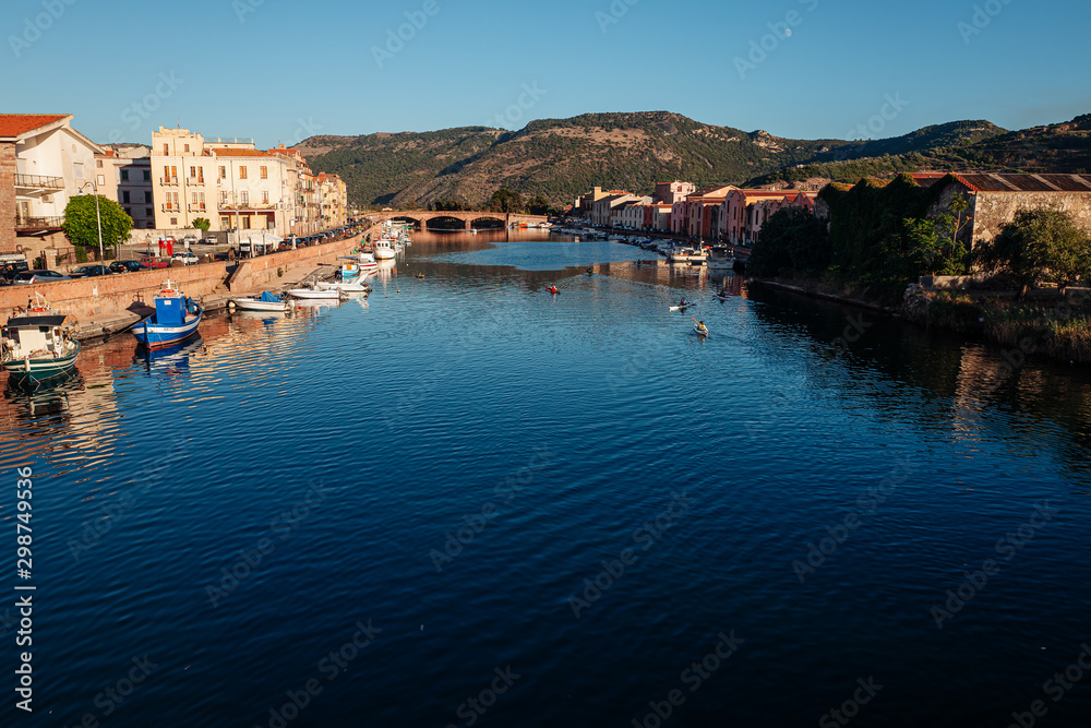 BOSA, ITALY / OCTOBER 2019: Life in the colorful fishermen's village in the north iof Sardinia
