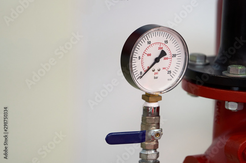 Pressure gauge psi meter on white background with copy space