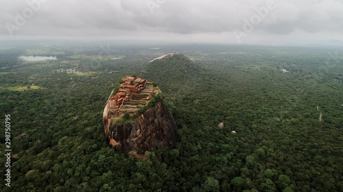 Aerial of LION ROCK SIGIRIYA , Sri Lanka  Central Province.Tourists visiting famous Lion Rock fortress with ancient gardens.
