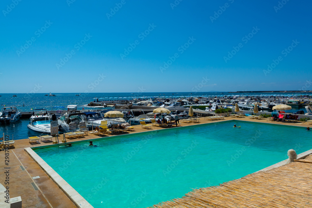 View on San Felice Circeo sea bay with swimming pool and pier, Lazio, Italy
