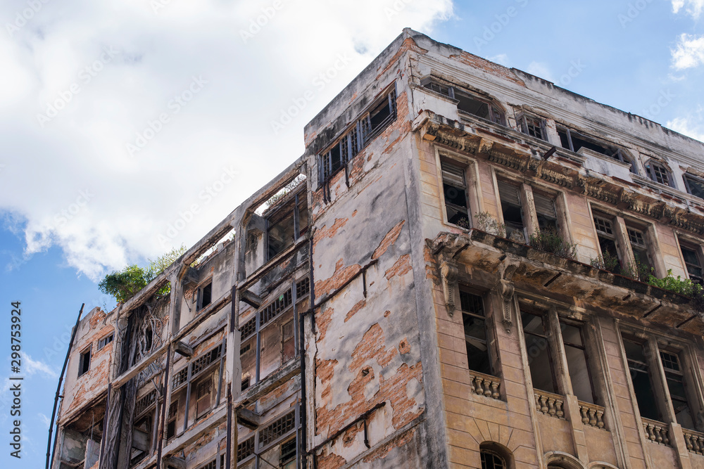 Facade of building in ruins in Cuba