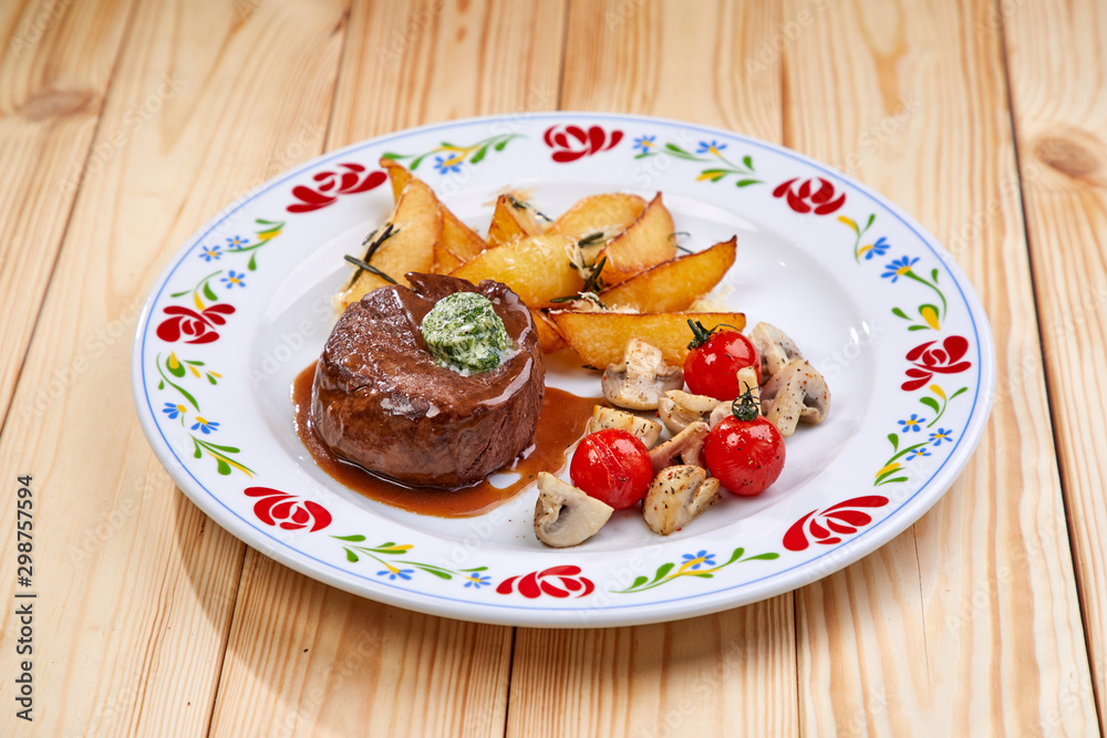 steak with baked potatoes and mushrooms