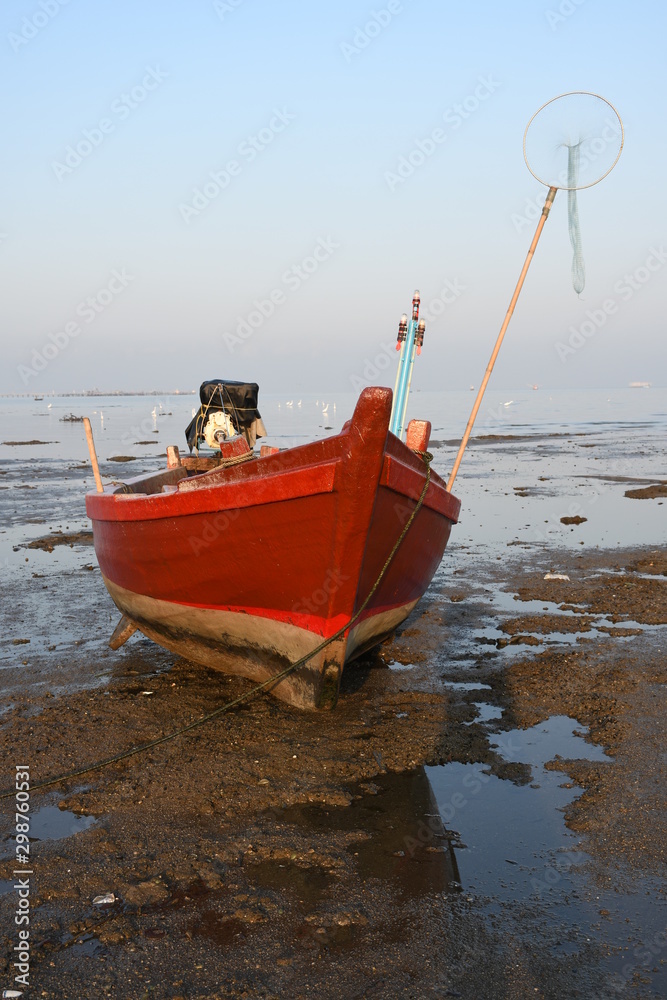 Fototapeta premium fishing boat on the beach