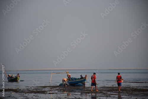 fishing boat at sunset © laemthong
