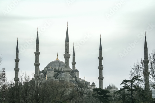Landscape of Sultanahmet camii during a December grey morning in Istanbul, Turkey. Also called Blue Mosque, it is a muslim place of worship, symolb of ottoman architecture and an Istanbul landmark