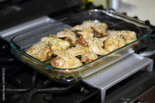 Marinated teriyaki chicken wings about to be baked in the oven.