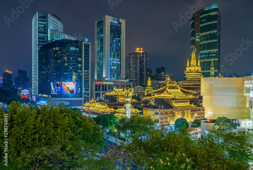 Jing'an Temple is a Buddhist temple on the West Nanjing Road in Shanghai, China. Jing'an District, where it is located, is named after the temple. photo