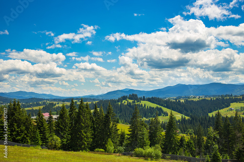 Amazing Panoramic View of the Mighty Carpathians Mountains and Beautiful Blue Sky Background.