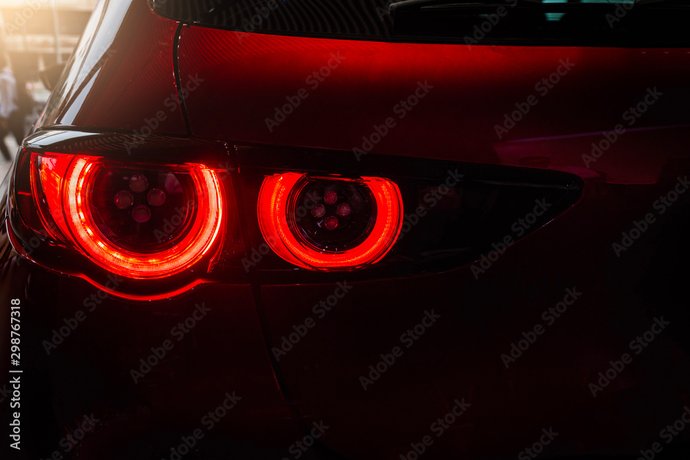Close up car tail light red color on service blurry background.Using wallpaper background for automobile transport and automotive image. - obrazy, fototapety, plakaty 