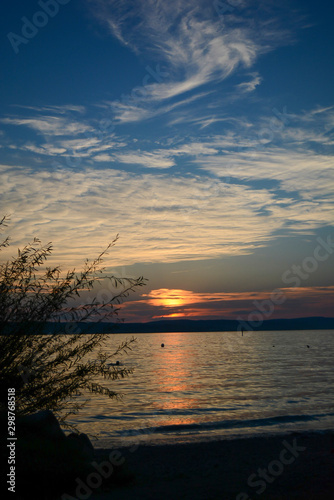 Fototapeta Naklejka Na Ścianę i Meble -  Sunset Sea Dune Beach Clouds Silhouette picture