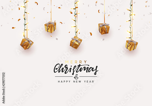 Christmas background. Xmas design hanging from light garland with realistic gift boxes strewn with golden confetti. Handmade calligraphic lettering text Merry Christmas and Happy New Year.