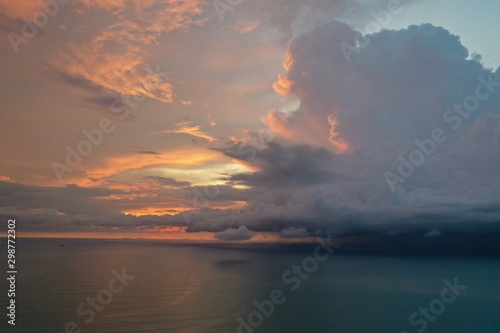 Storm at sunset over ocean 
