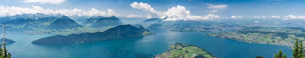 Switzerland, Panoramic view on green Alps in clouds and lake Lucerne