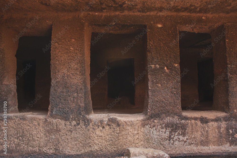 The Kanheri Caves are a group of caves cut into a massive basalt outcrop in the forests of the Sanjay Gandhi National Park, on the island of Salsette in the western outskirts of Mumbai, India.