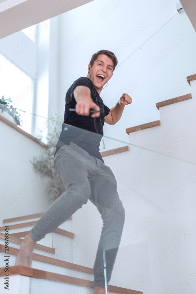 happy man dancing to his favorite music