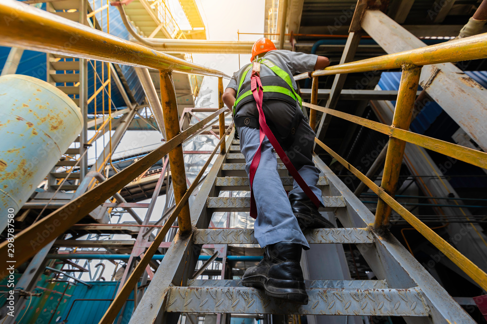 Worker ware safety belts in construction site close up equipment safety concept,Worker high building outdoors sprinkle with rope safety sure, wear equipment protective Worker ware safety belts in construction site close up equipment safety concept,Worker high building outdoors sprinkle with rope safety sure, wear equipment protective