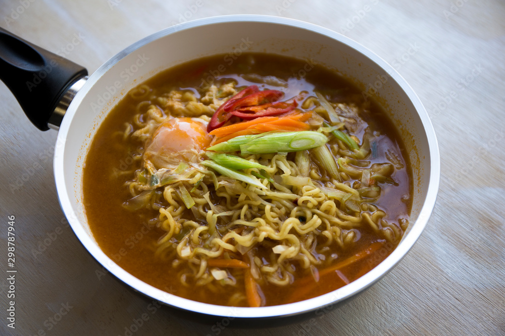 Korean scpicy vegetable ramen in the pan Korean scpicy vegetable ramen in the pan