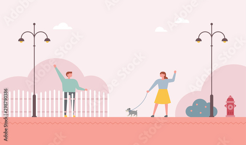 Neighbors greet each other with a fence in between.