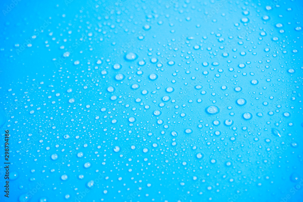 Water drops on blue background.