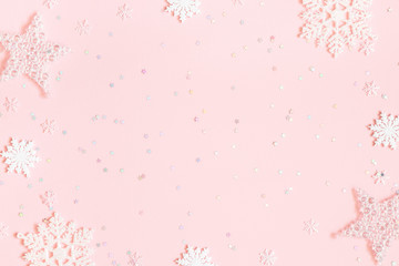 Christmas composition. White decorations on pastel pink background. Christmas, winter, new year concept. Flat lay, top view, copy space