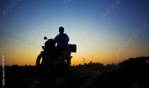 man with mototrcycle going through