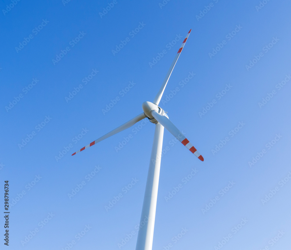 Wind turbines generating electricity with blue sky. Wind turbines generating electricity with blue sky.