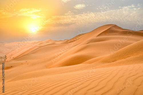 Sunset at the Edge of the Rolling Sand Dunes in the Empty Quarter  Arabian Desert  outside Abu Dhabi  United Arab Emirates
