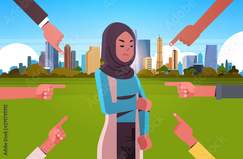 depressed arab woman being bullied surrounded by hands fingers mocking her peer violence bullying social anxiety concept cityscape background flat portrait horizontal vector illustration