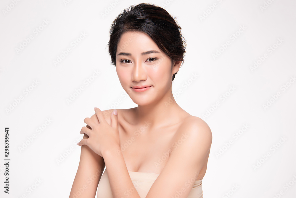 Beautiful Young Asian Woman hand Touching on Shoulder. Clean and Fresh skin, isolated on white background,Beauty Cosmetology Concept, Beautiful Young Asian Woman hand Touching on Shoulder. Clean and Fresh skin, isolated on white background,Beauty Cosmetology Concept,