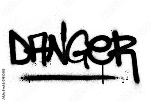 graffiti danger word sprayed in black over white