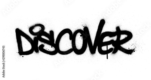 graffiti discover word sprayed in black over white