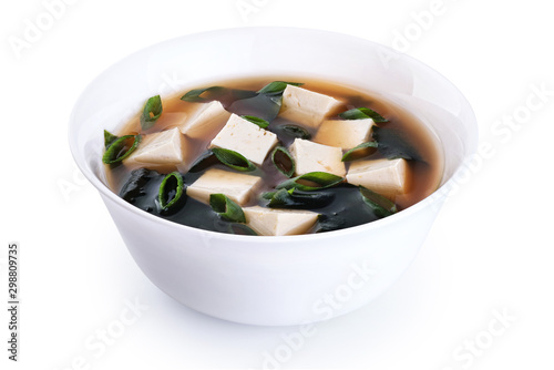 Bowl with miso soup isolated on white background.