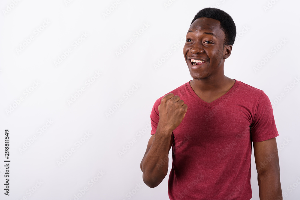 Young handsome African man against white background Young handsome African man against white background