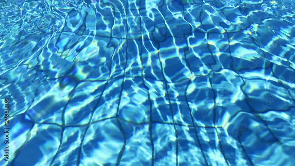 In the pool, waves are refected by the sun