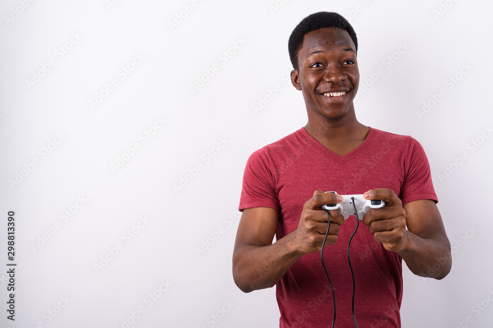 Young handsome African man against white background Young handsome African man against white background