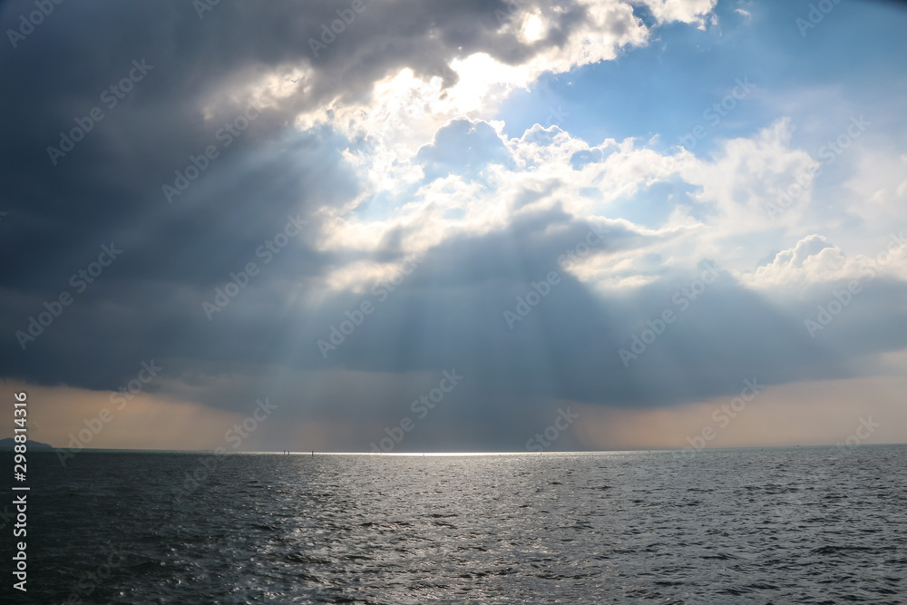 bule sky with beautiful Light shining down on the sea bule sky with beautiful Light shining down on the sea