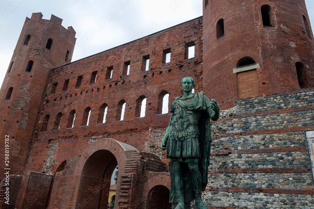 Porta Palatina Turin, a statue of the roman emperor Caesar at the Porta Palatina, Turin, Piemonte, Italy