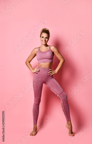Sports girl on a pink background